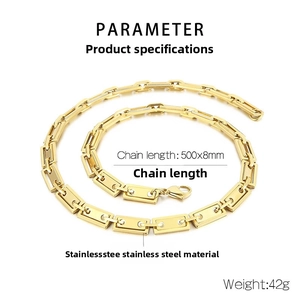 Detailed view of industrial gold stainless steel link chain with secure lobster clasp