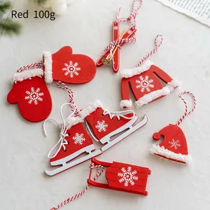 Red wooden Christmas ornaments set featuring gloves, sleds, and skates for tree decoration