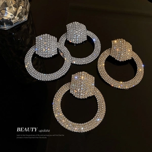 Exaggerated silver and gold hoop earrings with sparkling rhinestones for women