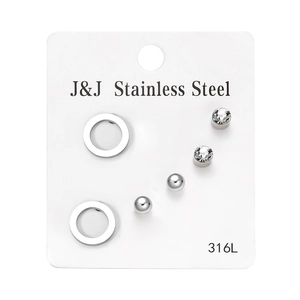 Detail view of 3 pairs of 316L stainless steel stud earrings set on a white display card
