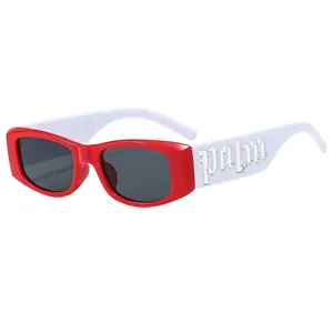 Kids vintage sunglasses with red frame white temples and silver Palm side decoration
