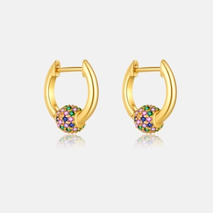 Detailed macro view of S925 golden hoop earrings with colorful zircon crystal ball charms