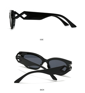 Close-up of black cat-eye sunglasses with unique geometric diamond hollow temples
