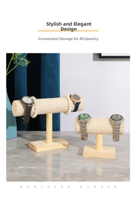 Linen jewelry display set with two T-bar stands for bracelets and watches on marble surface