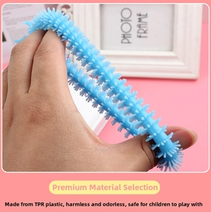 Blue stretchy TPR unicorn sensory toy with soft textured spikes for stress relief and kids