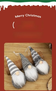 Three-piece set of grey knitted Christmas gnome ornaments with snowflake patterns