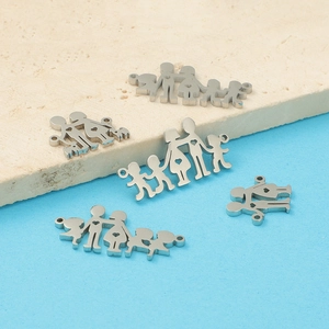Detail view of silver stainless steel family member charms with kids and parents