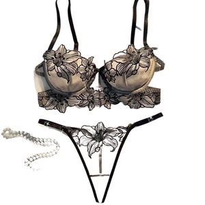 Sensual lace mesh lingerie set with floral embroidery and white lily patterns