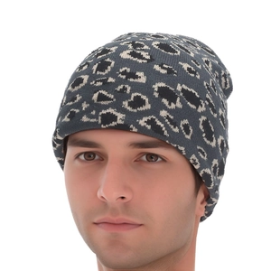 Detail of leopard print knitted beanie with thick texture and warm gray winter fabric
