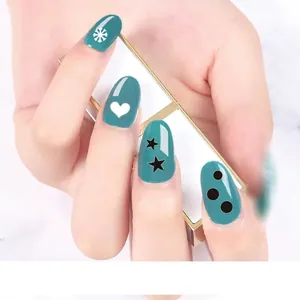 Japanese style nail art stickers featuring green base with white snowflakes and hearts