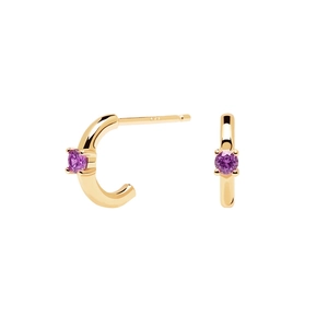 Detail view of gold-plated C-shape earrings with purple zircon in a four-prong setting