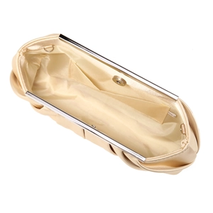 Detailed interior of beige satin evening clutch bag showing metal frame and small pocket