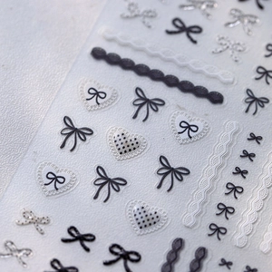 5D embossed bow nail stickers with black white patterns and lace texture details