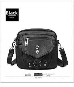 Détail du sac bandoulière noir avec fermetures éclair et rivets sur similicuir souple