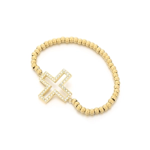 Bracelet à perles dorées avec un pendentif croix ajourée rétro orné de cristaux blancs