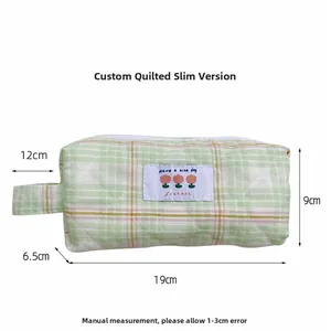 Detailed size chart of green quilted checkered pencil case with measurements