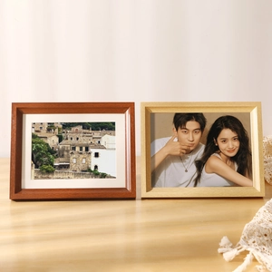 Minimalist solid wood picture frames in brown and natural oak for wall and tabletop display