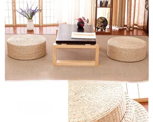 Close-up of handwoven round straw tatami floor cushion in two different heights