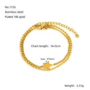 Detail of 18K gold-plated stainless steel double-layer bracelet with star charm