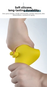Close-up of soft silicone yellow duck drain cover showing high flexibility and resilience