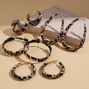 Chic leopard print hoop earrings set in various sizes and shapes with golden accents