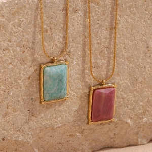18K gold plated necklace featuring rectangular green and pink natural stone pendants on rock