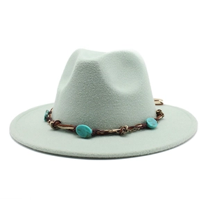 Detail of sage green wool fedora hat featuring bohemian turquoise beaded headband