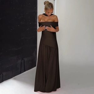 Detail of elegant chocolate brown off-the-shoulder pleated maxi dress with slit