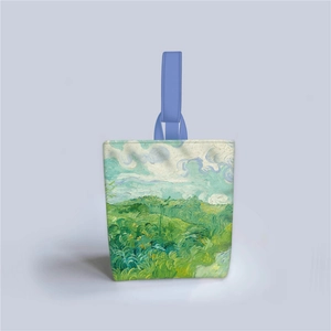 Detail of van Gogh style oil painting canvas tote bag featuring green wheat fields