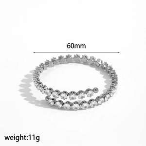 Detailed view of silver zircon studded bracelet with 60mm diameter and 11g weight