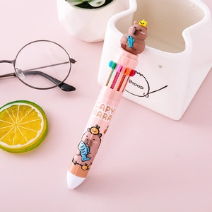 Pink multi-color Capybara ballpoint pen with a 3D cartoon topper on a pastel background