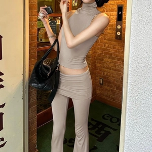 Women's chic khaki sleeveless high neck top and slim fit flared trousers set
