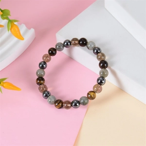 8mm natural tiger eye stone beaded bracelet for men and women on a modern display