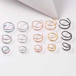 Set of 15 stainless steel spiral nose rings in five colors and three distinct sizes