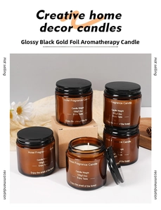 Detail of 100g amber glass jar scented candle with black metal lid in home setting