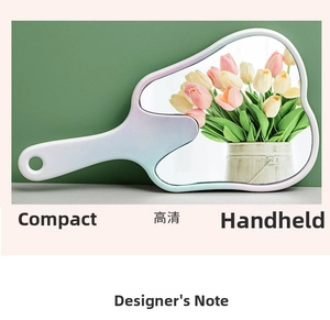 Detail of compact handheld makeup mirror with pastel gradient wave frame and hanging hole