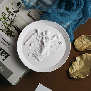 Detailed relief of angel and woman on a white vintage jewelry tray silicone mold