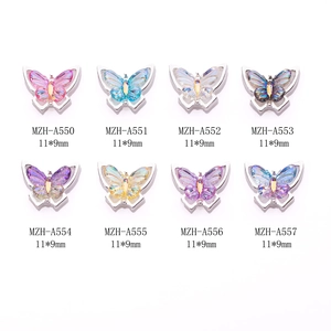 Colorful 3D butterfly nail charms in various gradient finishes with metal frames