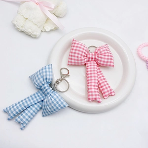 Cute pink and blue plaid fabric bow keychains for bags with silver metal clasps