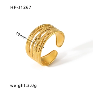 Detail showing 10mm wide multi-layer braided texture on 18k gold plated stainless steel ring