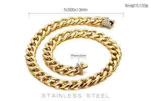 Detail view of 13mm gold stainless steel Cuban chain necklace with rhinestone buckle