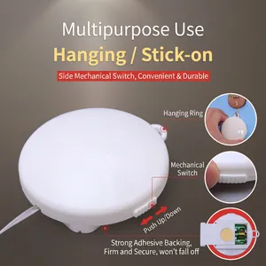 LED Christmas light controller base with hanging hook, adhesive back, and manual switch