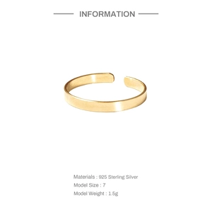 Detail showing 925 sterling silver ring with 18K gold plating and weight specifications