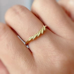 Minimalist S925 sterling silver golden leaf ring shown in a detailed close-up on hand