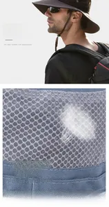 Detail of breathable mesh fabric and wide brim on outdoor sun fishing hat
