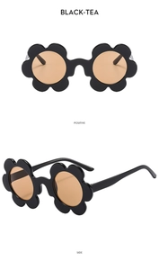 Front and side views of kids flower sunglasses with black frames and tea lenses