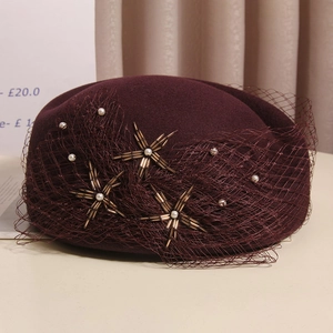 Elegant wine red wool beret with mesh veil and star-shaped pearl embellishments