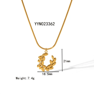 Golden titanium steel necklace with wheat leaf pendant 21x18mm size and 7.4g weight detail