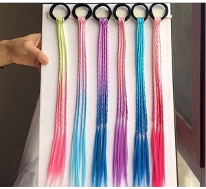 Close-up of 6 colorful gradient braided synthetic hair extensions on a black elastic band