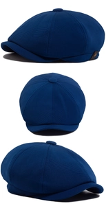 Vues détaillées d'une casquette gavroche bleu marine montrant la texture du tissu sergé